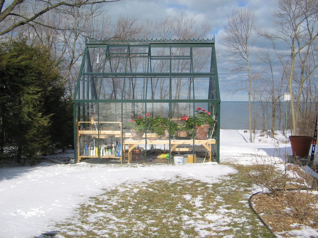 Cross Country greenhouse during winter snow dusting