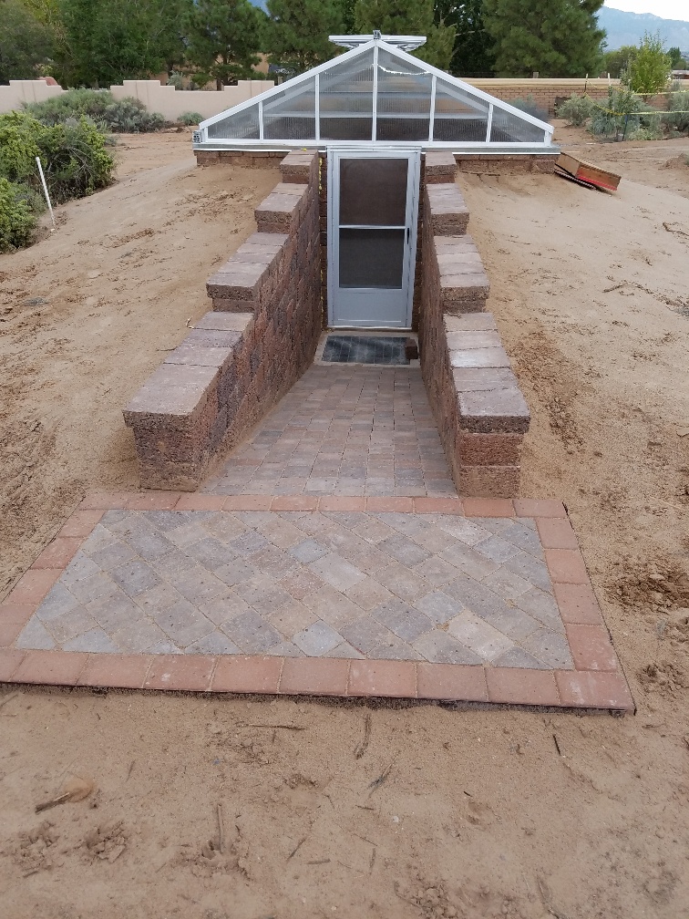 Walipini underground greenhouse entrance