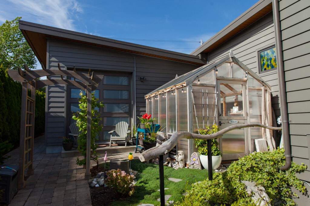 Charley's Alpine Insulated Heritage Wood Greenhouse with Dutch Door with full polycarbonate glazing and no pony walls