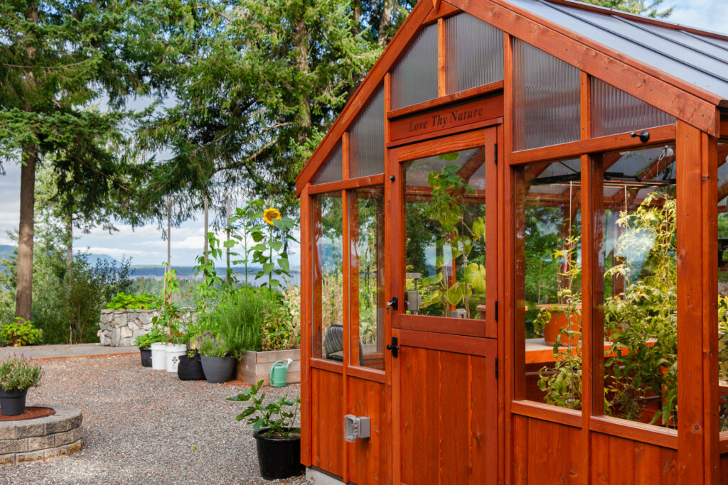 Alpine Insulated Heritage Wood Greenhouse 10x14 with double glass glazing, dutch door, and ponywall